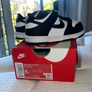 New Nike, low dunks, black and white never used size 8 for a toddler